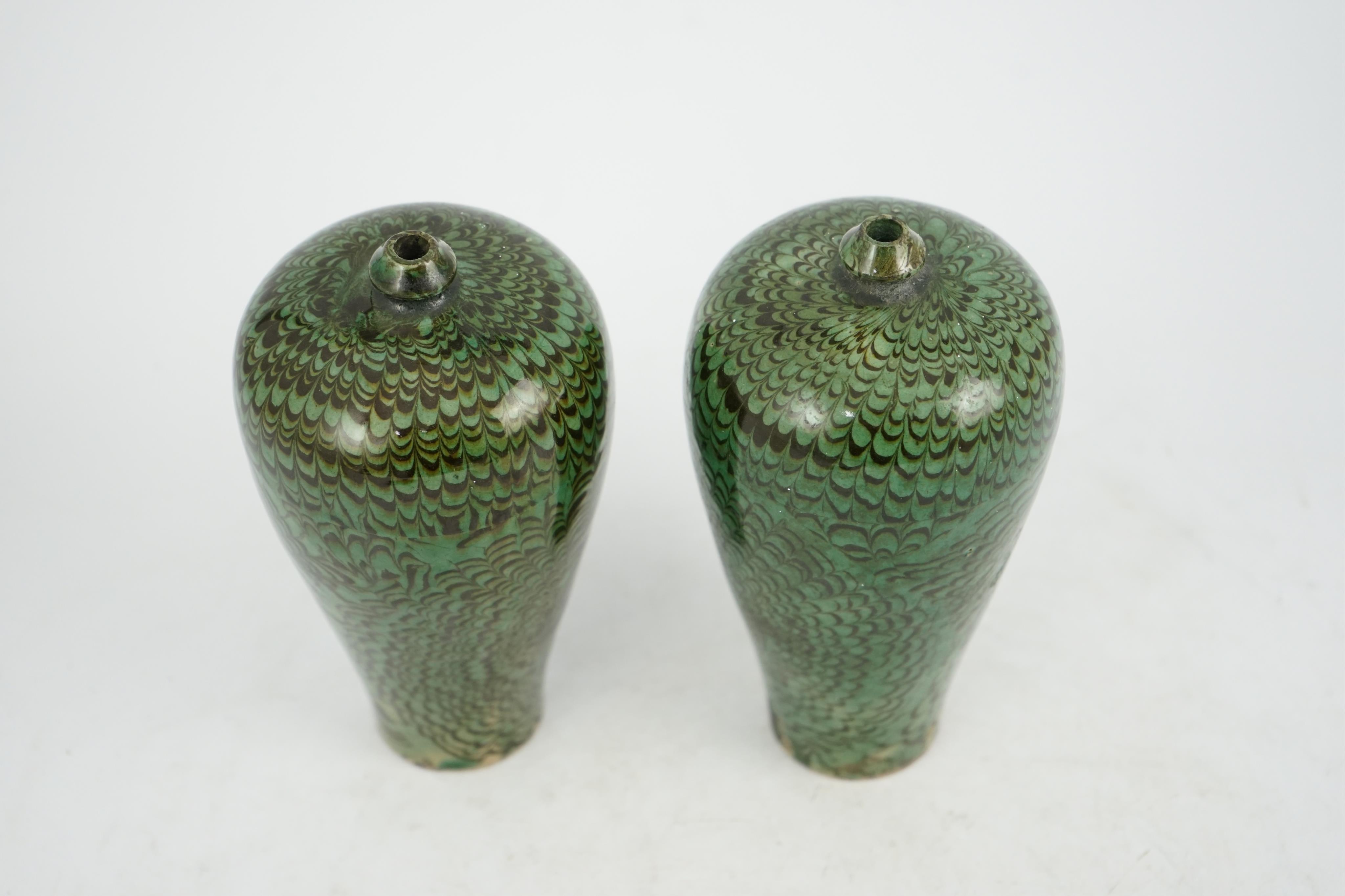 A pair of Chinese Cizhou green glazed meiping, probably Ming dynasty